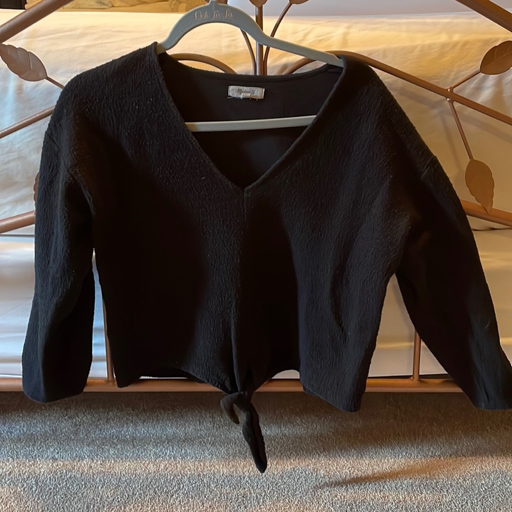 Cropped black sweater from Madewell.